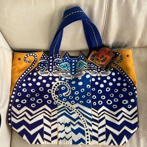 Laurel Burch Feline Friends Large cut out shoulder purse. Brand new. Colorful.